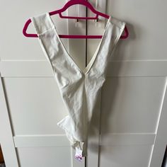 Nwt Dainty Hooligan White Criss Cross Bodysuit. Perfect For A Bachelorette Weekend! From Smoke And Pet Free Home. White V-neck Bodysuit For Loungewear, Chic Sleeveless Cotton Bodysuit, Summer Cream Bodysuit For Loungewear, Cream Bodysuit For Summer Loungewear, White Lined Bodysuit For Loungewear, White Sleeveless Bodysuit For Loungewear, Cream Fitted Bodysuit For Loungewear, Fitted Cream Bodysuit With Lined Body, Cream Fitted Bodysuit With Lined Body