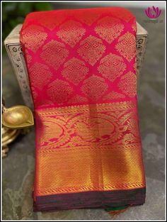 A beautiful brocade Kanchipuram/Kanjivaram silk saree in Pink. The body of the saree has brocade pattern with grand Pink border. The border has beautiful peacock motifs and zari work. It has a grand pallu with beautuiful zari woven buttas all over and Peacock motifs. This comes with an unstitched pink blouse piece with similar border. A very beautiful saree perfect for bridal and wedding occasions. Silk mark certified. Handloom saree. Handmade tassels on both sides Blouse - Unstitched Please not Navratri Saree With Temple Jewelry And Pallu, Navratri Saree With Temple Jewelry, Navratri Temple Jewelry Saree With Pallu, Diwali Puja Temple Jewelry Saree, Banarasi Silk Dupatta For Puja With Temple Jewelry Style, Diwali Saree With Zari Work And Temple Jewelry Style, Banarasi Silk Saree With Zari Weaving And Temple Jewelry, Banarasi Silk Saree With Zari Weaving, Tussar Silk Saree With Zari Work And Temple Jewelry