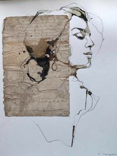 a piece of paper with a woman's face drawn on it