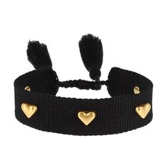 a black bracelet with gold hearts and tassels