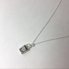 Nwot Sterling Silver Necklace | Lock Pendant With Cz Stones In Heart Shape On Front Of Lock | Stamped 925 | Length Is Approx 18.25" 16-inch Sterling Silver Necklace In Silver, Sterling Silver Square Pendant Necklace For Anniversary, Sterling Silver Heart Necklace With Initial Pendant, Silver 925 Stamped Everyday Necklace, Everyday Nickel Free Open Heart Necklace, 16 Inch Silver Necklace For Anniversary, 16-inch Silver Necklace For Anniversary, Small Personalized Sterling Silver Necklace, Sterling Silver Clasp Pendant Necklace For Everyday