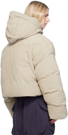 Down-filled enzyme-washed cotton canvas puffer jacket. · Bungee-style drawstring at hood and hem · Funnel neck · Zip closure with velcro placket · Welt pockets · Dropped shoulders · Extended sleeves · Inset rib knit cuffs · Zip pocket at interior · Fully lined Supplier color: Medium grey Fill: 90% duck down, 10% duck feather. Hooded Cotton Puffer Jacket For Cold Weather, Outdoor Cotton Puffer Jacket With Detachable Hood, Hooded Cotton Puffer Parka, Hooded Cotton Puffer Jacket With Pockets, Hooded Cotton Puffer Jacket With Padded Collar, Urban Cotton Hooded Puffer Jacket, Cotton Hooded Puffer Jacket With Double-lined Hood, Cotton Puffer Jacket With Double-lined Hood, Urban Cotton Puffer Jacket For Cold Weather