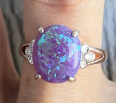 Awesome Deep Lavender Purple Blue Flash Opal 10x12mm Lab Created Stone in Sterling Silver Ring. This Stone Has Depth and Flash Galore! Adjustable Size From 5-9.5 Which I Can Set For You, Tell Me The Size. Purple Oval Opal Ring For Gift, Oval Purple Opal Ring For Gift, Petal Ring, Fire Opal Ring, Ring Blue, Lavender Purple, Opal Ring, Opal Rings, Fire Opal