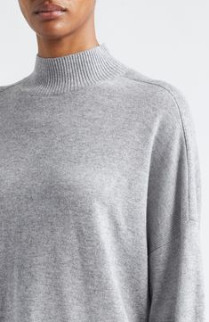 A blend of wool and cashmere yarns adds a luxuriously soft feel to this timeless mock-neck sweater framed by cozy ribbed trim. Mock neck Long sleeves Ribbed cuffs and hem 47% wool, 36% viscose, 10% polyamide, 7% cashmere Hand wash, dry flat Imported High Neck Cashmere Sweater In Fine Knit, High Neck Cashmere Sweater, Cashmere Yarn, Cashmere Blend Sweater, Mock Neck Sweater, Neck Sweater, Mock Neck, Cashmere, Hand Wash