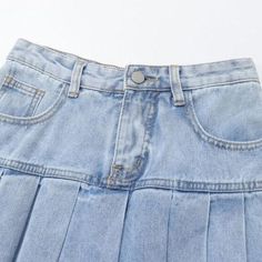 Elevate your style with our iconic 90s-inspired pleated miniature jean skirt from the 2023 Summer Collection. Perfect for sunny summer days and breezy summer nights. this mid-rise skirt features a light wash. a zipper & button closure. and pleats that will take your look to the next level.Why You'll Fall In LoveThis 90s-inspired mini skirt is the perfect blend of feminine charm and timeless style. With its mid-rise form and light wash. it's sure to add instant style to your wardrobe. The pleats. Trendy Pleated Short Denim Skirt, Y2k Style High Rise Denim Skirt For Summer, Y2k High Rise Denim Skirt For Summer, Y2k Style Pleated Mini Skirt For Summer, Casual Pleated Denim Skirt For Spring, Trendy Denim Pleated Mini Skirt, Y2k Pleated Mini Skirt For Summer, Trendy Medium Wash Mini Skirt For Summer, Pleated Denim Mini Skirt For Spring