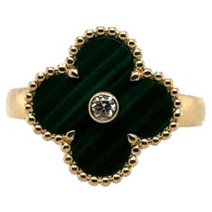 Stunning Van Cleef & Arpels Alhambra ring. Dark green Alhambra with central diamond set in 18k yellow gold.JE625873, 750 stamped on inside. Comes with original box and bag. Size 5.5 Alhambra Ring, Van Cleef Arpels Diamond, Van Cleef And Arpels, Van Cleef Arpels, Diamond Set, Van Cleef, Fashion Rings, Dark Green, Diamond Ring