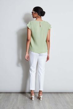 Plisse pleating lends a femme twist to this playful pastel Top. Soft Flutter sleeves & its relaxed fit make it the perfect shirt for warm summer days - pair it with jeans, shorts, or a skirt- it's that versatile. T-Tahari Floral Print Shirt with Plisse Pleats & Short Flutter Sleeves Runs true to size. Model is 5'9" and wearing size S Imported Style #: THF43028 Pastel Top, Floral Print Shirt, Pleated Shorts, Pair Of Pants, Knit Jacket, Flutter Sleeves, Print Shirt, Perfect Shirt, Jeans Shorts