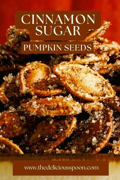 cinnamon sugar pumpkin seeds on a plate with text overlay that reads, cinnamon sugar pumpkin seeds