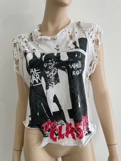 The clash punk t shirt, custom distressed, uniquely designed backside with  custom shoulder chains. Punk T Shirt Diy, Edgy Distressed Tops For Concert, Rocker Distressed Tops For Streetwear, Distressed Rocker Tops For Streetwear, Distressed Rocker Tops For Alternative Fashion, White Distressed Tops For Concert, Distressed Punk Style Tops For Festivals, Edgy Distressed Tops For Festival, Punk Distressed T-shirt For Festivals