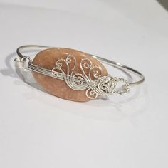 Beautiful Unique Natural Handmade Orange Aventurine Gemstone 925 Silver Wire Wrapped Bangle Bracelet- Ed30361 The Item You See Is The Exact Piece You Will Receive-Excellent Quality & Design~ Brand New-Unique-Beautiful, Natural, Large, Orange Aventurine Gemstone-925 Sterling Silver Stamped-Bangle-Wire Wrapped-Detailed Design-Handmade Please See Photos For Shape/Curves/Condition/Colors/Texture/Style/Design/Engraving I Want You To Have The Very Best Shopping Experience, Please Review Item Photos Wire Wrapped Gemstone Jewelry, Wrapped Bracelets, Gemstone Bangle Bracelets, Handmade Bead Jewellery, Wire Ideas, Orange Aventurine, Aventurine Bracelet, Wire Wrapped Bangles, Wire Jewelry Rings