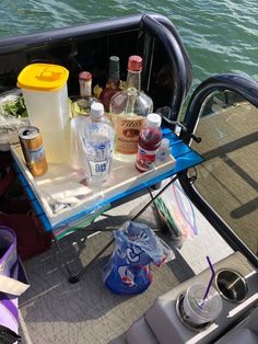 the back end of a boat filled with drinks