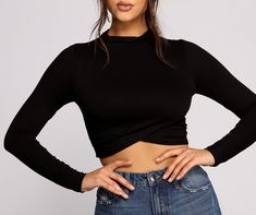 Be a total stylish stunner in this chic crepe knit crop top! Featuring a high neckline. a cropped tulip hem and a form-hugging fit. this top would pair perfectly with high waist denim and heeled booties. Make this part of your new fall wardobe!Fit & Features High neckline Long fitted sleeves Cropped tulip hem Form-fitting style Crepe knit fabric Moderate stretch Homecoming Outfits, High Waist Denim, Cropped Tops, Selling Clothes, Knit Crop Top, Knit Crop, Black Crop Tops, High Waisted Denim, High Neckline