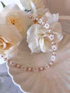 Enhance your jewelry collection with the timeless beauty of our Handmade Beaded Flower Pearl Necklace. Perfect for elevating any outfit, this set is a must-have for those who appreciate the finer details. Order now and experience the elegance of handcrafted jewelry!                                                             o❀⋆.ೃ࿔*:･ Key Features: o❀⋆.ೃ࿔*:･ Handmade Craftsmanship: Each piece is meticulously handcrafted, ensuring unique and high-quality jewelry. Elegant Design: The combination o Adjustable White Jewelry With Flower Decoration, Feminine Flower Jewelry With 3d Flowers, Feminine Gold Jewelry With 3d Flowers, Feminine 3d Flower Jewelry, Adjustable Flower Charm Necklace For Wedding, Feminine Single Strand Jewelry With Round Beads, Feminine Single Strand Round Beads Jewelry, Elegant Beaded Flower-shaped Jewelry, Adjustable Flower Necklace For Wedding