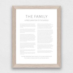 the family is a poem written in white ink on a wooden framed wall above it