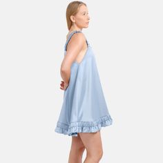 Step into understated glamour with the Ripple Satin Slip Mini Dress in Sky Blue. Crafted from premium satin, this piece shimmers with a luxurious sheen, while ruffled straps and hem add playful elegance. The optional belt tie with signature golden embellishments enhances its designer charm and fit. Sustainably made in Australia, this dress offers a breathable, durable, and effortlessly chic look, perfect for both day and night Slip on 100% Polyester Satin Optional Belt tie with signature golden Summer Date Night Modal Satin Dress, Summer Modal Satin Dress For Date Night, Spring Modal Satin Dress For Night Out, Summer Modal Satin Dress For Night Out, Modal Satin Summer Dress For Night Out, Spring Date Night Modal Satin Dress, Spring Modal Satin Dress For Date Night, Modal Satin Silk Dress For Date Night, Chic Modal Satin Dress For Daywear