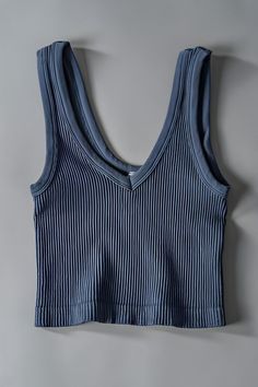 This comfortable stretchy tank doubles as the cutest top and layering piece, perfect for every day! 95% Nylon, 5% Rayon Size Guide: measurements taken laying flat Small: Across the chest: 10.5” Top of shoulder to hem: 13.5” Neck hem to bottom hem: 7” Medium: Across the chest: 11.5” Top of shoulder to hem: 14.5” Neck hem to bottom hem: 7.5” Large: Across the chest: 12” Top of shoulder to hem: 15” Neck hem to bottom hem: 7.5” Cute Basic Shirts, Blue Top Aesthetic, Aesthetic Tank Tops, Womens Tank Tops, Cute Tank Tops, Summer Tank, Summer Tank Tops, British Indian, Layering Pieces