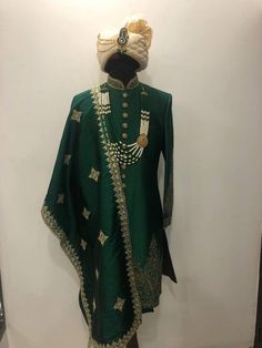 Hand Embroidered Groomswear Sherwani Set in Dark Green and Gold Anarkali Sherwani With Zari Work For Traditional Ceremonies, Eid Sherwani With Resham Embroidery For Traditional Ceremonies, Semi-stitched Embroidered Anarkali Sherwani, Embroidered Jamawar Sherwani With Traditional Drape, Anarkali Sherwani With Zari Work, Anarkali Style Sherwani With Zari Work, Anarkali Sherwani With Zari Work In Straight Kurta Style, Embroidered Semi-stitched Sherwani, Traditional Sherwani With Intricate Embroidery For Eid