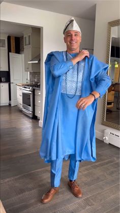 Experience the elegance of Nigerian fashion with our Luxury Sky Blue Agbada for Men, a custom-sized African suit ideal for weddings and special events. This exquisite piece of men's clothing combines traditional design with a modern twist, making it a perfect choice for those seeking a unique and culturally-rich attire. Key Feature: 👔 Tailored Elegance: Custom-sized for a perfect fit, exuding sophistication at every turn. 🎨 Vibrant Authenticity: Crafted with premium materials, boasting intricate African-inspired detailing. 🌟 Statement Piece: Elevate your style with this [luxurious] ensemble, commanding attention effortlessly. 💪 Comfort Redefined: Designed for [maximum comfort], ensuring you feel as good as you look. 🎉 Versatile Appeal: Perfect for weddings, celebrations, or any occasi Blue Traditional Wear With Dabka For Groom, Blue Traditional Agbada For Ceremonies, Blue Agbada For Traditional Ceremonies, Fitted Blue Kurta For Groom, Traditional Blue Agbada For Ceremonies, Blue Long Sleeve Traditional Wear For Groom, Blue Agbada With Dabka Detail, Elegant Blue Thobe For Traditional Ceremonies, Elegant Blue Kurta For Traditional Ceremonies