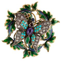 The beautiful butterfly brooch is finely crafted in 14 k white gold with turqouise ,sapphire, amethyst,emerald and diamonds weighing approximately a total of 1.00 carat. Circa 1920's. Colorful and beautiful daily brooch. Luxury Turquoise Brooches, Luxury Turquoise Brooches For Gift, Elegant Butterfly Brooch For Collectors, Elegant Collectible Butterfly Brooches, Elegant Butterfly Brooch, Elegant Butterfly Brooches For Collectors, Elegant Collectible Butterfly Jewelry, Green Butterfly Brooch Jewelry, Vintage Jewelry Ideas