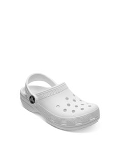 Crocs Unisex Classic Clogs - Little Kid White Synthetic Closed Toe Slip-ons, Casual White Slip-on Mules, White Non-slip Slip-ons With Round Toe, White Non-slip Clogs For The Beach, White Non-slip Clogs For Beach, White Slip-resistant Sandals For Spring, Comfortable White Round Toe Mules, Classic White Slip-on Sandals, White Mules With Rubber Sole For Beach