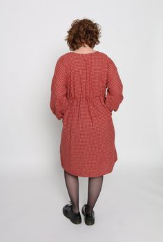 Meet our Clara Dress. This gorgeous dress has an elastic waistband, long sleeves with elastic at the wrists, a knee length gathered skirt, and pockets. We love the subtle festive feel of these fabrics. Perfect for the holiday season and beyond! Long Sleeve Gathered Skirt Fall Dress, Long Sleeve Dress With Gathered Skirt For Fall, Red Smock Midi Dress, Long Sleeve Dresses With Elastic Waistband, Fall Midi Dress With Gathered Waist For Daywear, Fall Dress With Elastic Waistband For Daywear, Elastic Waistband Dress For Fall Daywear, Long Sleeve Dresses With Elastic Waistband For Daywear, Casual Red Dresses With Elastic Waistband