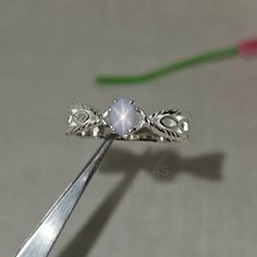 ⭐100% NATURAL PHOTOS ⭐Brand- AS jewellers ⭐Country/Region of Manufacture: India ⭐Material- Sterling Silver ⭐Metal Purity : 925 parts per 1000 ⭐Main Stone: White Star Sapphire ⭐Main Stone Creation: Natural ⭐Size Of Stone= 6x4mm ⭐Main Stone Weight : (1.00)Carat Approx. ⭐Stone Origian : Srilanka { Ceylon } ⭐Nature of stone: The Stone will show star When any source of Light Fall it. The source Should be pointed And strong Example Mobile flesh, Sun light, Torch. ⭐We Provide Three Platting- Sterling S Star Engagement Ring Silver, Light Fall, Sapphire Silver Ring, Oval Sapphire Ring, Star Sapphire Ring, White Sapphire Engagement Ring, Promise Ring Gift, Sun Light, Star Sapphire