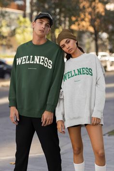 This super cool vintage style Wellness sweatshirt for athleisure lovers. Order a size up if you like oversized look. ------------------------------------------------------------------------------------------------------------------------------------------------- * 50% cotton, 50% polyester * Pre-shrunk * Classic fit with no center crease * 1x1 athletic rib knit collar with spandex * Air-jet spun yarn with a soft feel and reduced pilling ----------------------------------------------------------- Green Sports Hoodie With Crew Neck, Green Crew Neck Sportswear Hoodie, Green Crew Neck Sports Hoodie, Oversized Casual Activewear For Leisure, Casual Oversized Activewear For Leisure, Urban Crew Neck Activewear, Green Crew Neck Athleisure Hoodie, Urban Crew Neck Winter Activewear, Sporty And Rich Sweatshirt