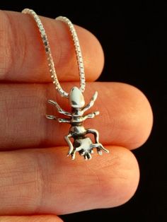 We all hope that this insect won't be on the guest list for our next picnic, but this detailed Ant Charm would like to be invited. The solid sterling silver charm is 5/8" long and completely three dimensional.All Marty Magic Charms and Pendents include an 18 inch (46cm) box chain. If you would prefer a different length of chain please feel free to contact me.This item usually ships the same or next business day All Marty Magic Jewelry is packaged in a beautiful purple box, embossed with the gold Bug Necklace, Bug Jewelry, Magic Jewelry, Magic Charms, The Guest List, Insect Jewelry, Funky Jewelry, Guest List, Jewelry Inspo