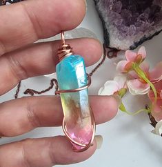 Rainbow Aura Quartz necklace, Quartz gemstone necklace, birthday gift for her, gift for him. A stunning Rainbow Aura Quartz pendant, wrapped with pure Copper wire. Thos pendant including the bail measure 5.5 cm in length. Rainbow Aura carries all of the Qualities of the Clear Quartz and is further enhanced with the copper wire, which acts as an energy amplifier. QUARTZ  is said to be a Master healer, helping to cleanse and balance each chakra. It also has the ability to charge other crystals. Th Iridescent Pendant Crystal Necklace For Healing, Mystical Iridescent Crystal Necklaces For Gift, Mystical Iridescent Crystal Necklace For Gift, Iridescent Spiritual Crystals For Gifts, Iridescent Crystals For Spiritual Gifts, Iridescent Spiritual Crystals As Gifts, Handmade Iridescent Crystal Necklaces For Spiritual Style, Iridescent Wire Wrapped Necklace For Gift, Iridescent Crystal Pendant Necklace For Gift