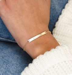 "Our sparkly bar bracelet is a great piece for your everyday look, engrave your favorite word or loved one's name so you could carry it with you at all times ♡ DETAILS * Materials : 14k Gold Filled / Sterling Silver. * Bar size : 35*4mm. * Bracelet chain type : Dainty Rolo. * Bracelet length : 6.25\"+1. 25\" extender = 7.5\" total length. PERSONALIZATION Make your shiny piece extra special by custom engraving!♡ * Engrave letters, initials, numbers and symbols on the bar! * We can engrave up to 1 Rectangular Engraved Bracelets For Everyday, Dainty Engraved Bracelets For Everyday Wear, Dainty Engraved Bracelets For Everyday, Dainty Engraved Bracelet For Everyday Wear, Dainty Everyday Engraved Bracelets, Minimalist Engraved Rectangular Bracelets, Minimalist Personalized Rectangular Bracelet, Nameplate Bracelets With Engraving Option For Everyday, Simple Adjustable Engraved Jewelry