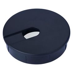 a black round object with a hole in the middle