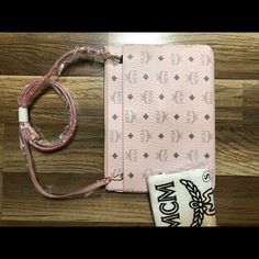 New Mcm Bag. Can Be Worn As A Clutch, Pouch, Or Crossbody. Pink With Gray Mcm Monogram. Great Color For Summer! Comes With Duster Bag. Designer Pink Pouch For Everyday Use, Luxury Pink Pouch For Everyday Use, Designer Pink Travel Pouch, Pink Pouch Clutch For Mobile Phone, Designer Pink Shoulder Bag With Mobile Phone Pocket, Designer Pink Pouch Shoulder Bag, Pink Mobile Phone Pouch Clutch, Pink Designer Pouch Shoulder Bag, Luxury Pink Clutch With Detachable Strap