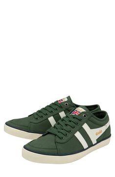 Contrasting stripes refine a comfy, versatile canvas sneaker set on a durable rubber sole. Lace-up style Textile upper and lining/rubber sole Imported Green Textile Sneakers With Vulcanized Sole, Green Casual Sneakers In Textile, Casual Green Cotton Sneakers, Green Cotton Sneakers With Vulcanized Sole, Green Cotton Sneakers With Rubber Sole, Green Canvas Shoes With Gum Sole, Sporty Lace-up Sneakers With Canvas Lining, Green Cotton Canvas Shoes Sporty Style, Green Cotton Sporty Canvas Shoes