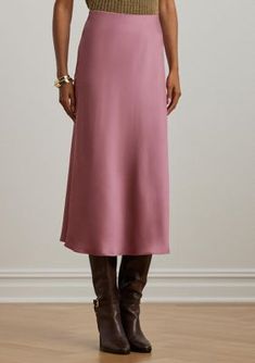 A staple piece that you can easily dress up or down, this Lauren Ralph Lauren midi skirt is rendered in silky satin charmeuse for a fluid drape and subtle sheen. A-line silhouette Intended to hit below the knee US size 8 has a 32.25" body length Skirt length is taken from the center back top edge and changes 0.25" between sizes Elasticized waist Unlined Model is 5'10" (178 cm) and wears a US size 4 | Lauren Ralph Lauren Women's Satin Charmeuse Midi Skirt, 10 Silk Midi Skirt Dress For Work, Ralph Lauren Style, Rose Blush, Satin Midi Skirt, Elegant Skirt, Slip Skirt, Weekend Wardrobe, Ralph Lauren Womens, Casual Coat