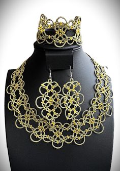 Delicate handmade tatting necklace, earrings, and bracelet set are timeless heirlooms that will complement your wardrobe with their sophisticated charm. The handmade craftsmanship and meticulous attention to detail are sure to impress anyone who sees them. Whether you're shopping for a special occasion or everyday elegance, this set will serve you well. This set also makes a wonderful gift for yourself or a loved one that will be treasured for years to come. Neckless length - 26 inches, can be e Elegant Filigree Jewelry Sets For Celebration, Elegant Filigree Jewelry Sets, Elegant Jewelry With Intricate Design And Round Beads, Elegant Handmade Beaded Necklace For Formal Occasions, Elegant Handmade Jewelry For Celebrations, Handmade Elegant Wedding Jewelry Sets, Elegant Formal Handmade Beaded Necklaces, Gold Jewelry With Bead Caps For Gift, Elegant Handmade Adjustable Jewelry Sets