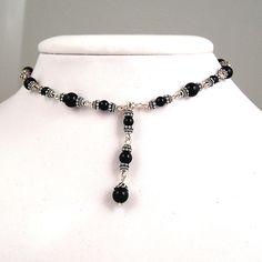 This sterling silver and onyx necklace is perfect for that little black dress.  It can be worn from 14 1/2 up to 18 1/2 inches.  The drop measures 1 3/4 inches in length. Black Beaded Necklace, Diy Jewelry Projects, Necklace Layered, Black Bead Necklace, Onyx Necklace, Jewelry Inspo, Drop Necklace, Jewelry Projects, Dream Clothes