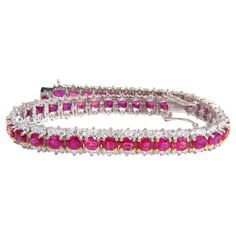 Ruby & Classic Three row Tennis. 10.26ct. Natural ruby bracelet. oval, full cuts Clean clarity Transparent & Vivid Reds. Average 3.5 X 3mm each 3.55ct Diamonds Rounds & full cuts Vs-2 clarity. G-color 14kt. white gold 15 Grams. Bracelet: 6.75mm wide 7 inch wearable length safety clasp/ snap lock $20,000 Appraisal Certificate will accompany. Luxury Ruby Diamond Bracelet For Formal Occasions, Formal Pink Ruby Bracelets, Formal Pink Ruby Bracelet, Luxury Red Diamond Tennis Bracelet, Classic Round Ruby Diamond Bracelet, Classic Ruby Diamond Bracelet, Red Oval Diamond Gemstone Bracelet, Luxury Red Diamond Bracelet, Luxury Red Diamond Wedding Bracelet