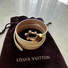 Louis Vuitton Monogram Vernis Triple Tour Bracelet. In Great Condition - Very Minimal West And Tear. Width: 0.5" Marks: Designer Signature Non-Gem Materials: Leather Signature: Louis Vuitton Made In France M10094 Metal Type: Brass Length: 19.75" Total Item Weight (G): 19.3 Maximum Length: 21.5 Louis Vuitton White, Louis Vuitton Jewelry, Leather Wrap Bracelet, Leather Wraps, Womens Jewelry Bracelets, Wrap Bracelet, Made In France, Louis Vuitton Monogram, Types Of Metal