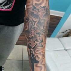 a person with a tattoo on their arm