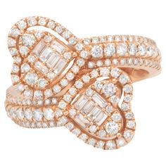 an 18k rose gold ring set with baguettes and round brilliant cut diamonds