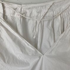 This gorgeous textile is French and dates from the late 1800's or very early 1900's . White, crisp cotton with lace detail. I love wearing these with boots! ~ GORGEOUS! Ideal for wearing, display or design inspiration ( Eskirt B611 ) MEASUREMENTS : This gorgeous Vintage French skirt measures : 34 inches long 28- inch waste CONDITION : I've freshly laundered and pressed this gorgeous textile. Beautiful condition indeed! ~ 05/18/2020 Vintage White Gathered Skirt Bottoms, White Regency Style Cotton Petticoat, Victorian Cotton Petticoat For Daywear, Victorian White Cotton Petticoat, White Cotton Cottagecore Bottoms, Cottagecore Cotton Skirt, Jb Monogram, Lace Apron, French Workwear