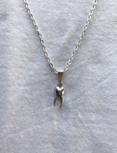 "Silver tooth pendent and chain.  Available in 18\", 20\" and 24\" chains. Any questions don't hesitate to drop me a message." Punk Necklace With Lobster Clasp As Gift, Nickel Free Emo Jewelry Gift, Nickel Free Emo Style Jewelry Gift, Nickel-free Emo Style Jewelry Gift, Edgy Necklace For Halloween Gift, Edgy Halloween Necklace Gift, Emo Chain Jewelry For Gift, Emo Necklace With Adjustable Chain For Gift, Grunge Jewelry For Halloween Gift