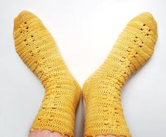 Crochet a pair of socks… but not just ANY socks ! super fast to make as they’re made using tall stitchesvery comfy to wear, with crocheted fabric about as thin as on knitted socks (plus you’ll use about the same amount of yarn as for knitted socks)Instructions available in 3 widths so you can make them for everyone !uses the “after-thought heel” technique so you can crochet another heel if the first one ever wears outNumerous step-by-step photos and tutorials. Pattern tested for maximum clari... Socks Crochet Pattern, Crocheted Socks, Socks Crochet, Crochet Socks Pattern, Crochet Abbreviations, Socks Pattern, Crochet Socks, Comfortable Socks, Socks For Women