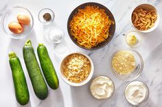 the ingredients for this dish include cucumbers, onions, cheese and sour cream