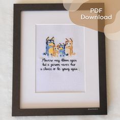 the cross stitch pattern is in a black frame