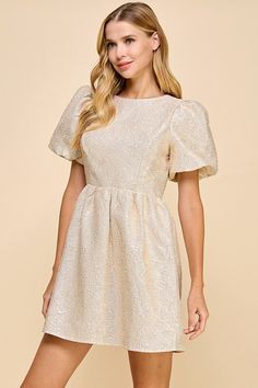 Textured metallic dress with puff sleeves and accented bow at the back neckline. With a concealed back zipper. -Puff sleeves -lined -lightweight -fabric content - 100% polyester Bow Back Dress, Bow Mini Dress, Elegance Dress, Plus Size Belts, Dress With Puff Sleeves, Curvy Jeans, Metallic Dress, Midi Maxi Dress, Tee Dress