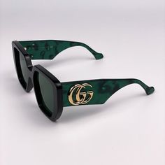 Gucci Gg0956s 001 Sunglasses Black Green Gold Women Gucci Collection 2021 Frame Shape Rectangle Frame Color Black / Gold Logo Frame Material Acetate Frame Type Full-Rim Lens Color Solid Dark Green Lens Material Nylon Size 54/19/145 Model Number Gg0956s Color Code 001 Gender Women 100% Uv Protection Authentic! Full Retail Package With All Accessories. Have All Colors Of Gucci Cases In Stock. Feel Free To Message Me The Color Of Case You Would Like To Get When Making A Purchase. Made In Italy Gucci Sunglasses Women, Gucci Cat Eye Sunglasses, Gucci Frames, Gucci Collection, Gucci Eyeglasses, Gucci Glasses, Silver Sunglasses, Sunglasses Women Oversized, Brown Sunglasses