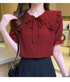 Office Tops With Collar In Solid Color, Red Short Sleeve Solid Color Shirt, Trendy Doll Collar Top For Summer, Casual Doll Collar Blouse For Work, Casual Doll Collar Tops For Work, Casual Black Blouse With Doll Collar, Casual Workwear Blouse With Doll Collar, Casual Workwear Top With Doll Collar, Red Short Sleeve Tops For Office