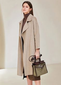 Keep your outfit looking chic and cozy with this belted, thigh-length wool coat for women. Completely crafted from 100% wool, this timeless classic will have you looking smart and feeling warm no matter where you go. Long sleeves Notched lapels Side-seam pockets Detachable belt 100% wool Dry clean Women's coat/jacket Item #3103110 Size info XS=US2=UK6=EU32 S=US4-6=UK8-10=EU34-36 M=US8-10=UK12-14=EU38-40 ★★ It would be helpful if you provided your height and weight so that I could assist you in c Chic Belted Wool Coat, Elegant Wool Coat With Belted Cuffs For Winter, Belted Long Wool Coat For Fall, Chic Wool Belted Pea Coat, Long Belted Wool Coat For Fall, Chic Belted Wool Coat With Lapel Collar, Fall Wool Coat With Belted Cuffs For Office, Chic Wool Coat With Belted Cuffs And Lapel Collar, Office Wool Coat With Belted Cuffs For Fall