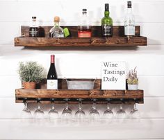 two wooden shelves holding wine glasses and bottles